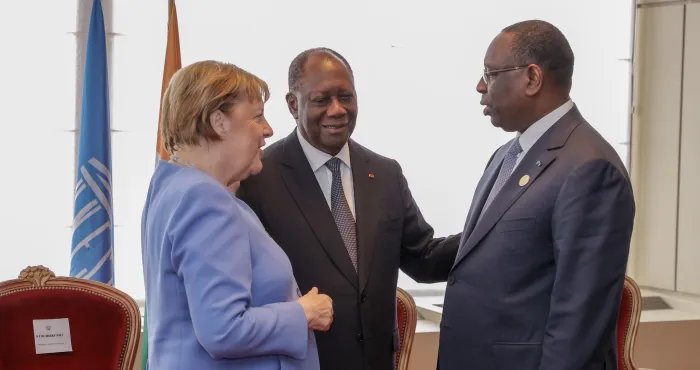 alassane-ouattara-a-angela-merkel-vous-avez-donne-une-grande-lecon-dhumanisme-au-monde